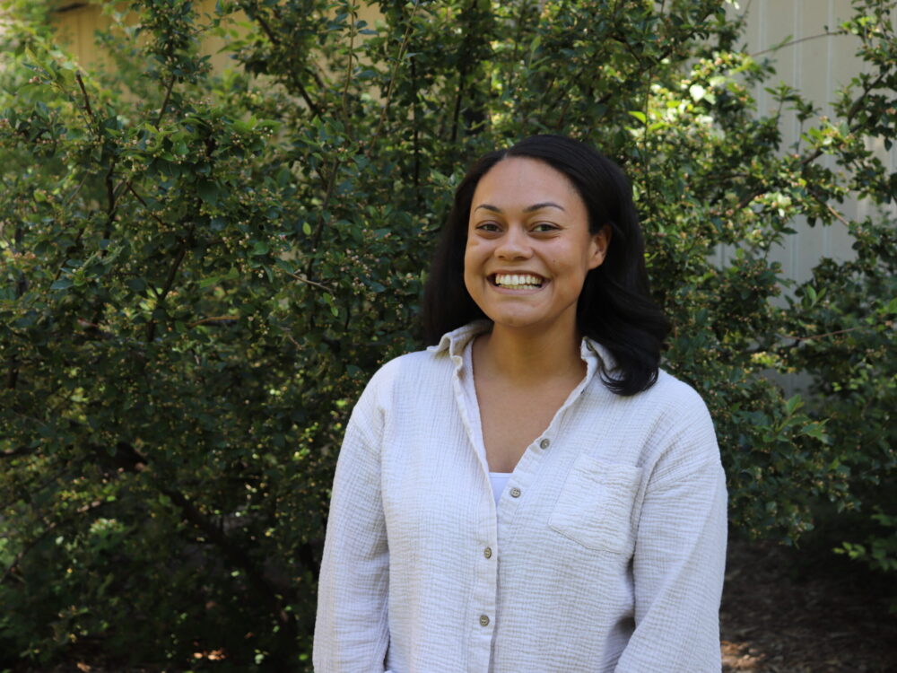 An outdoor portrait of AJ Johnson